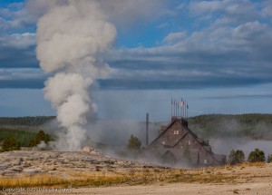 Old Faithful Geyser & Old Faithful Inn from accessible boardwalk, Yellowstone National Park WY